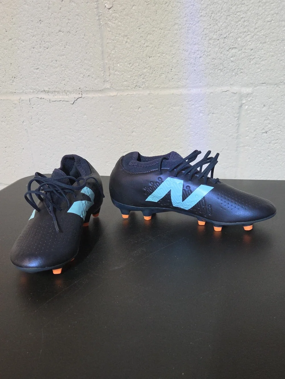 New Balance Men’s Navy Soccer Cleats with Light Blue Logo and Orange Studs